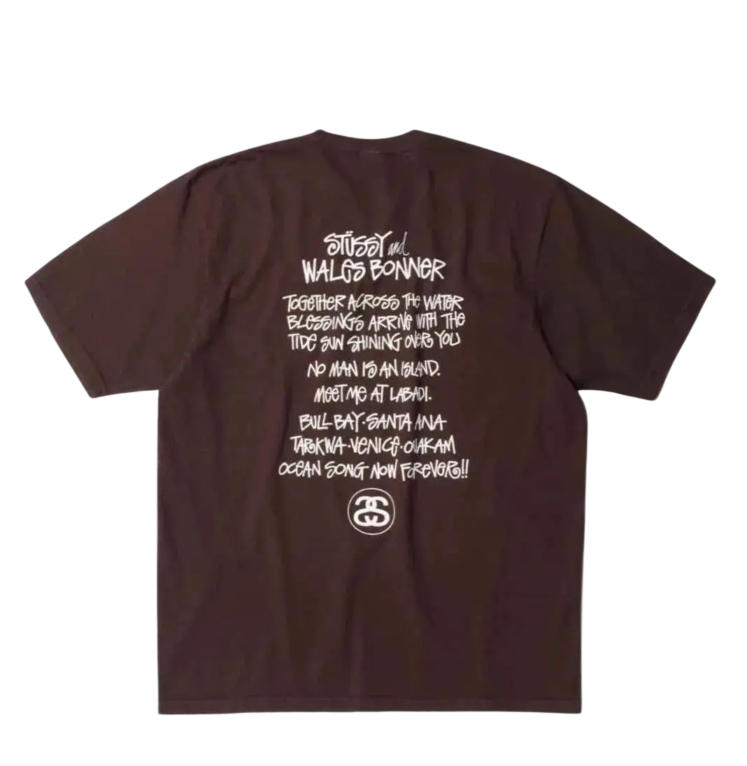 Back side of brown Stussy Wales Bonner Ocean Song Tee featuring white graffiti-style text print