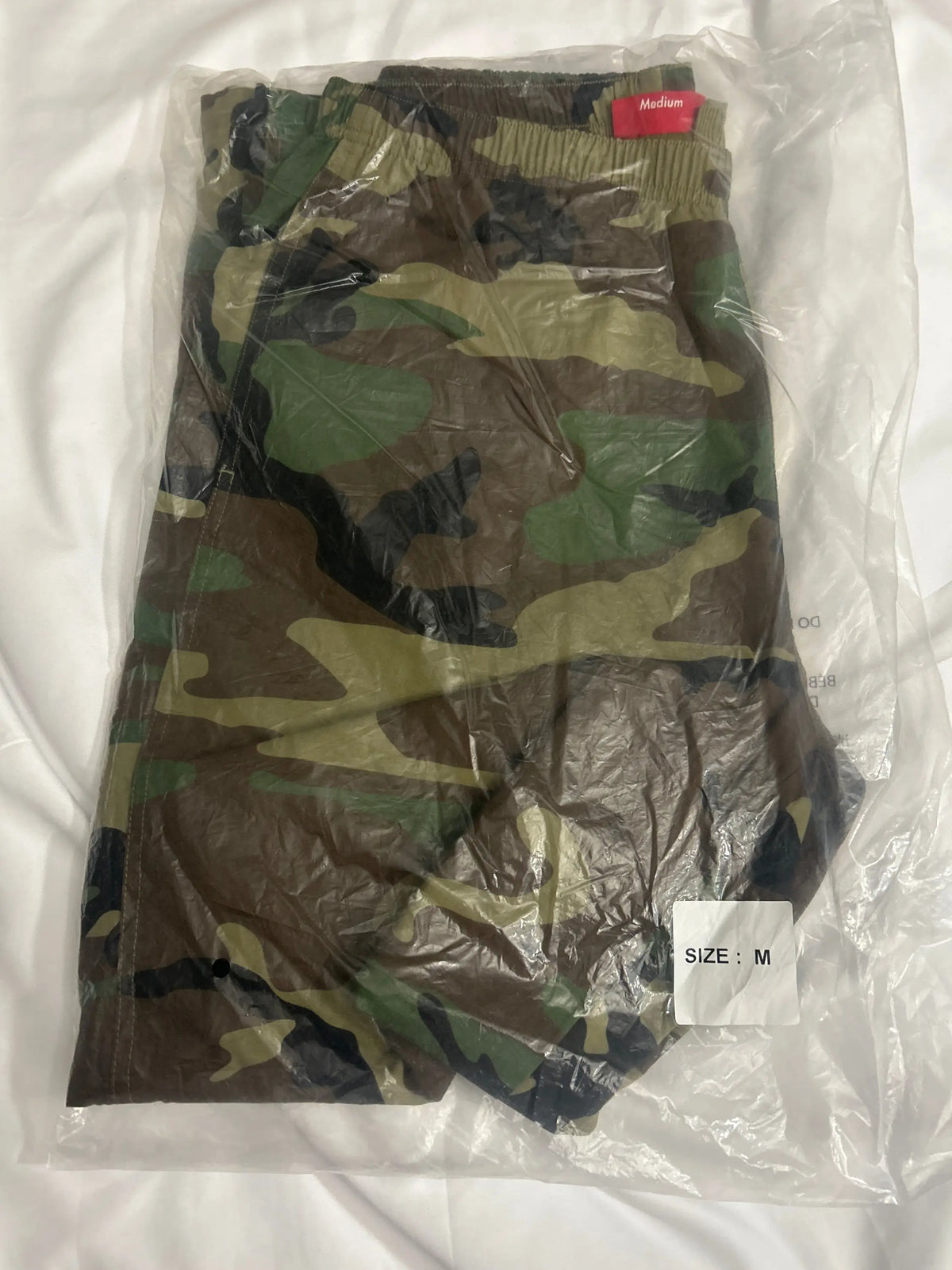 Supreme Spellout Embroidered Track Pants Camo