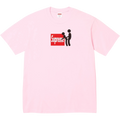 Pink supreme stick t-shirt with black stick figure graphic on red rectangular background front view