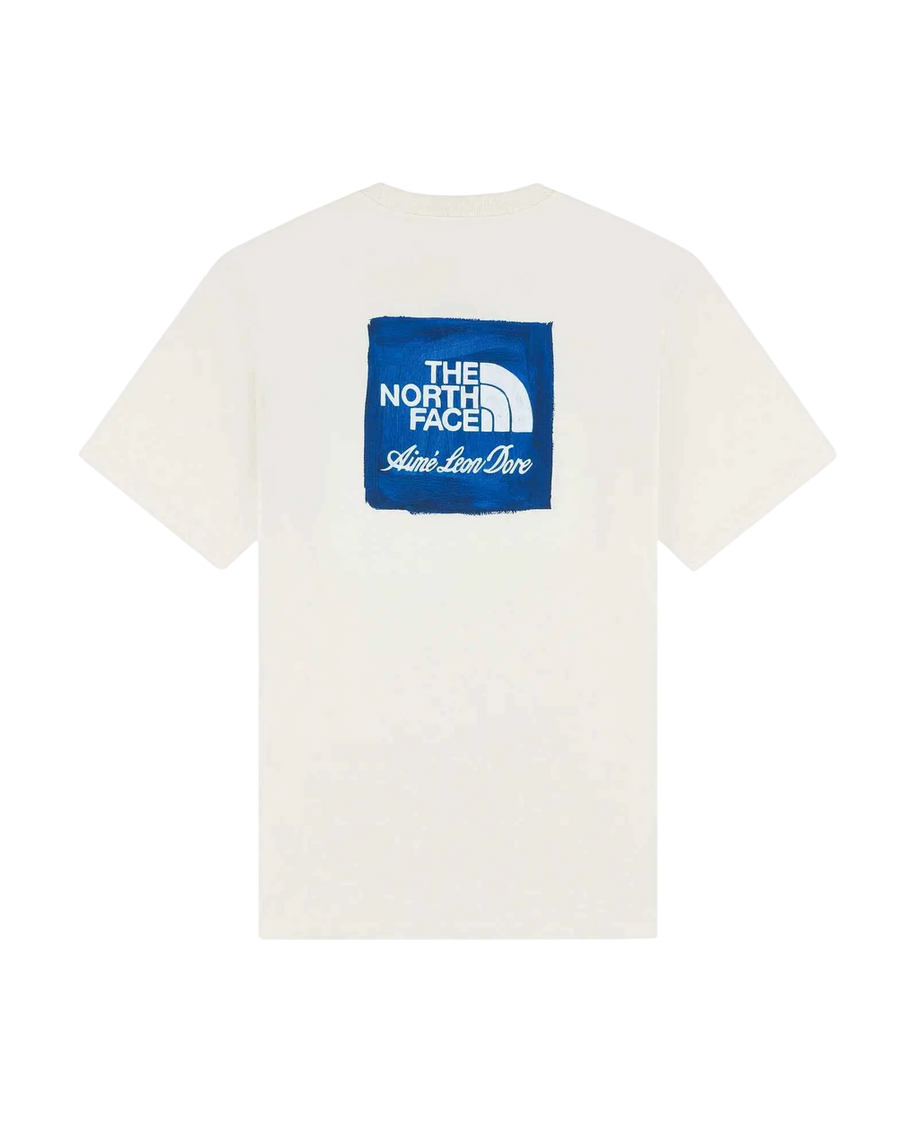 White cotton t-shirt featuring a blue square logo with the north face and aime leon dore text in ivory color