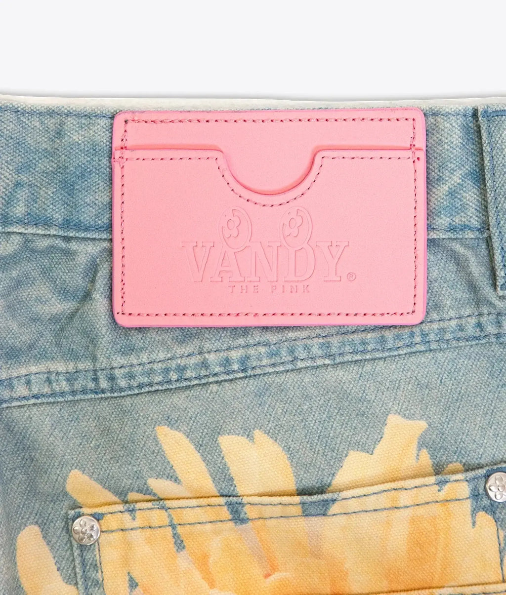 Pink leather card holder with embossed vandy logo from vandy the pink fries trompe loeil denim collection
