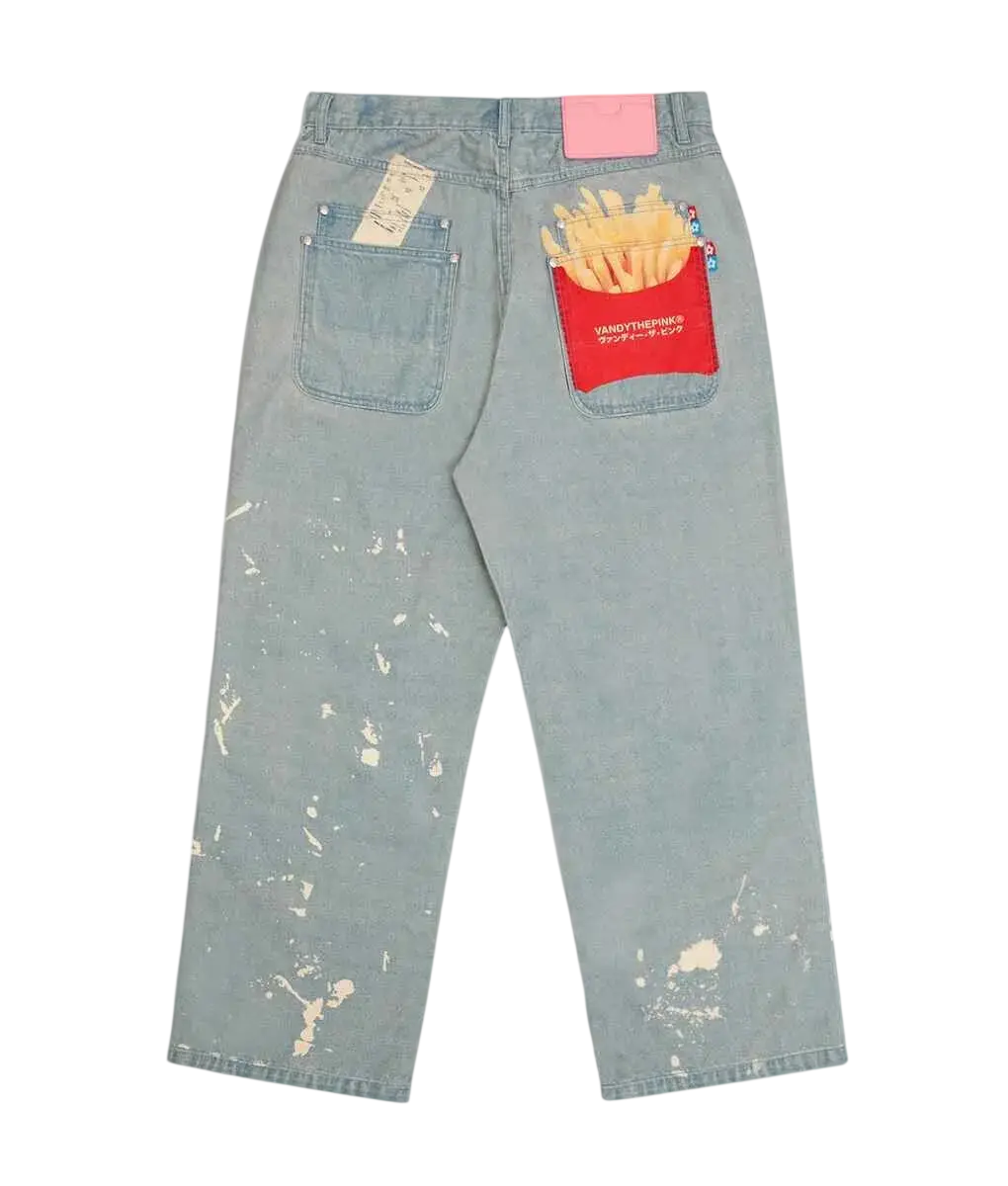 Light-wash denim jeans with a playful red french fry container pocket and golden fries embroidery by vandy the pink fries trompe loeil denim