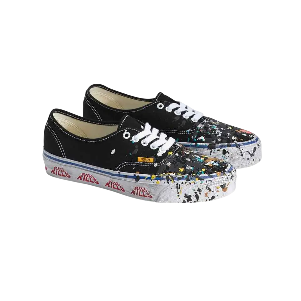 Black canvas Vans Authentic Reissue 44 sneakers with paint-splatter design white laces and red alls branding on the side