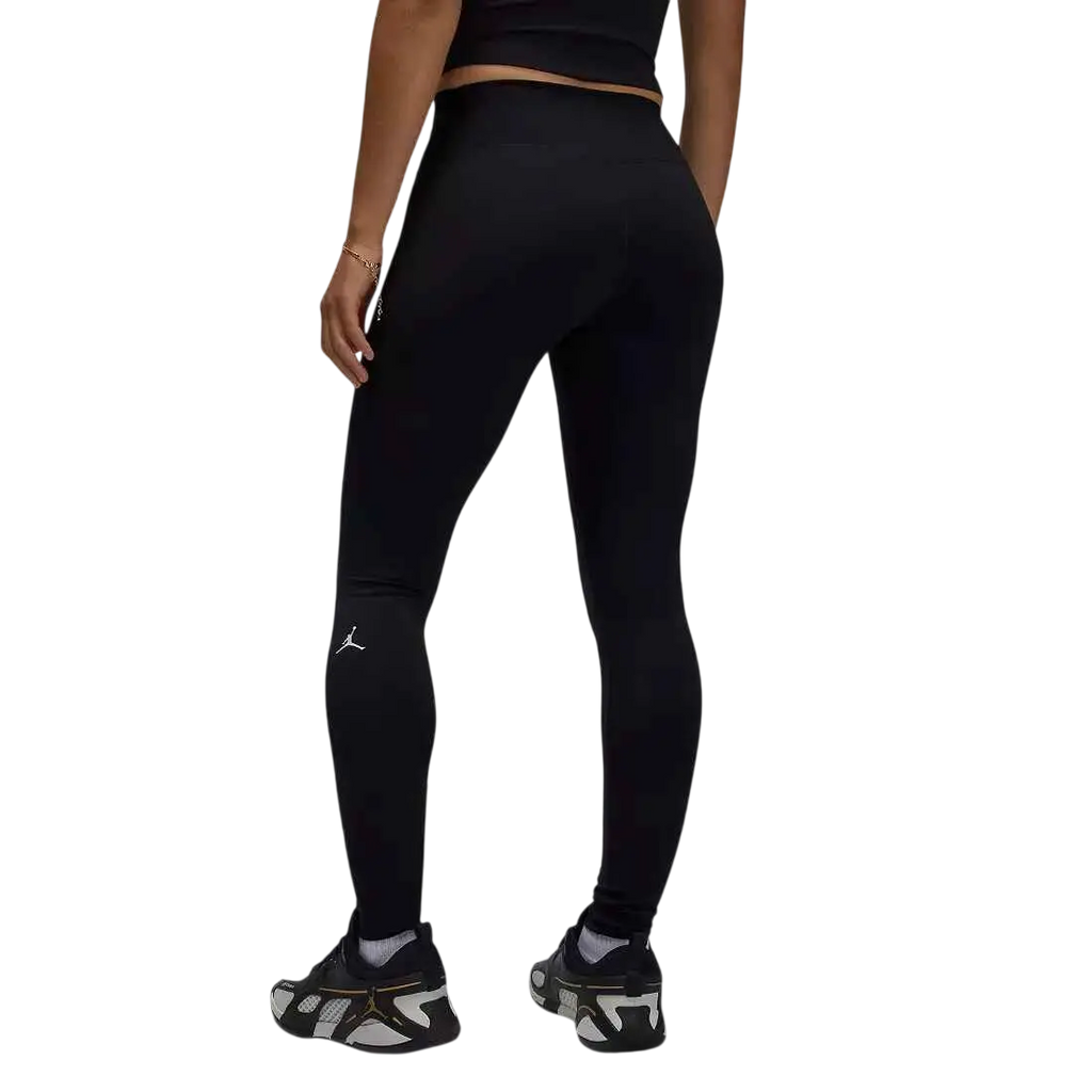 Women’s Jordan dri-fit black high waisted athletic leggings with a subtle white jumpman logo on the left thigh