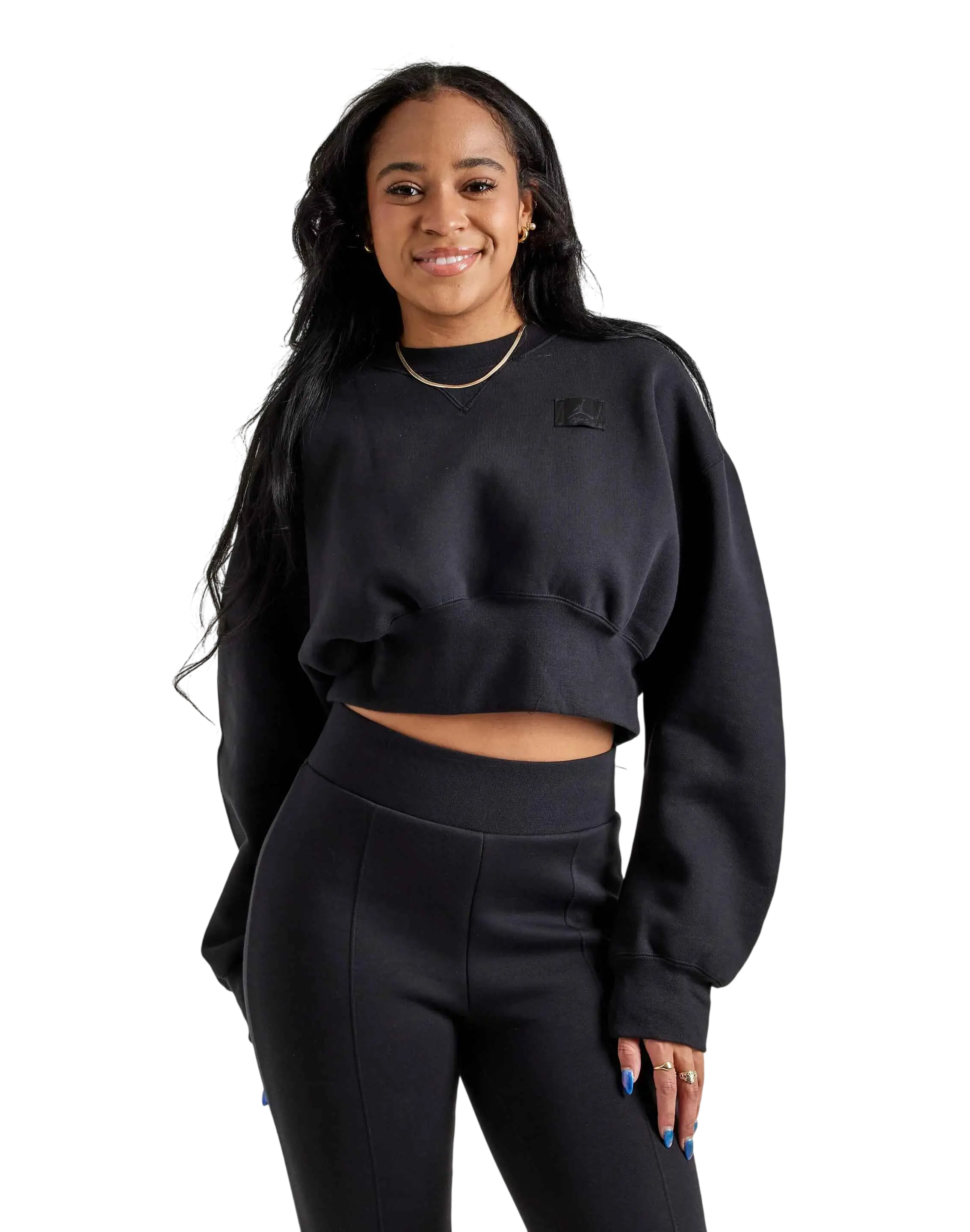 Women’s jordan fleece cropped sweatshirt in black with small chest logo made of soft fleece material
