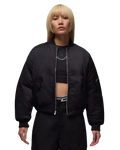Women’s Jordan Flight Renegade black puffer bomber jacket with silver zipper and subtle sleeve logo designed for warmth and style