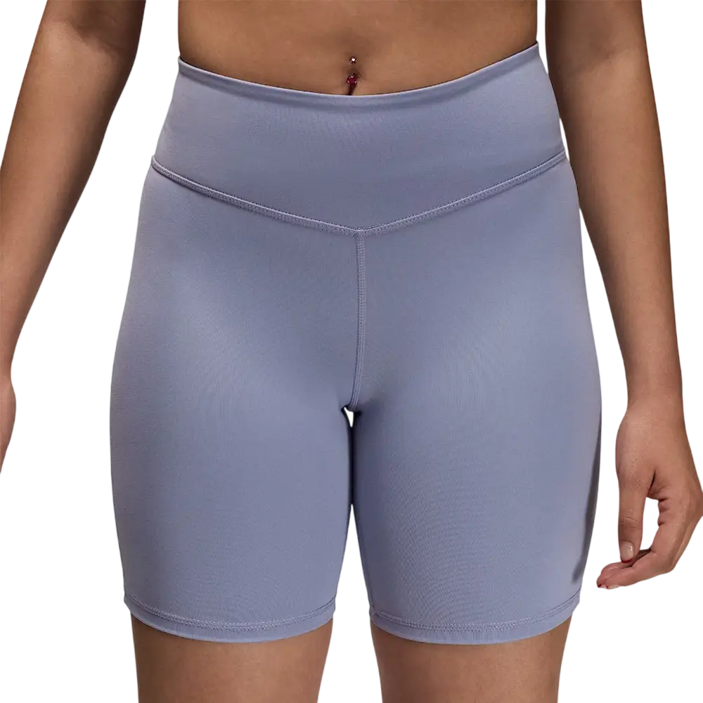Women’s Jordan Sport high waisted 7 inch bike shorts in indigo haze with smooth stretchy fabric and subtle seam detailing