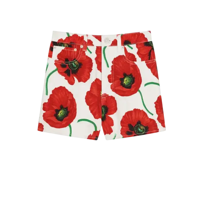 White women’s kenzo poppy shorts featuring vibrant red poppy floral pattern with green stems and dark centers