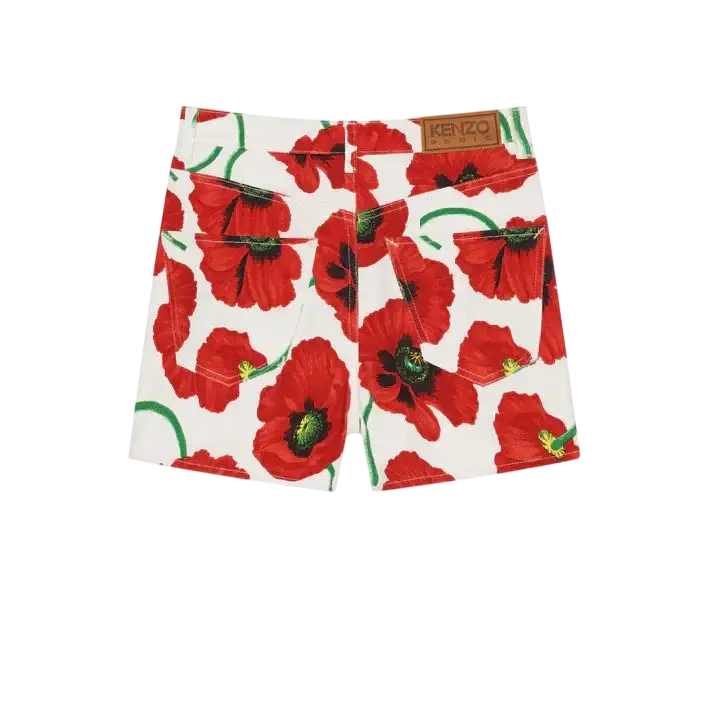 White women’s Kenzo shorts with vibrant red poppy floral pattern green stems black centers and brown Kenzo label