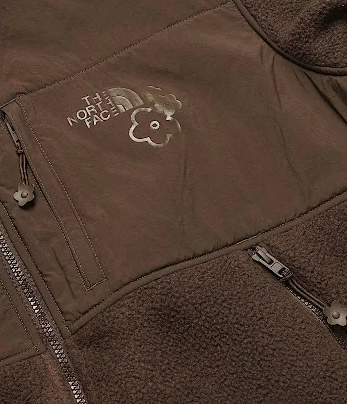 Women’s the north face x cecile bahnsen 1995 denali fleece vest in soil brown with embroidered chest pocket design